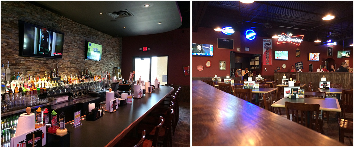 wing daddys Interior of Wing Daddy’s restaurant in San Antonio featuring a fully stocked bar, stone accent wall, neon signage, and spacious dining tables.