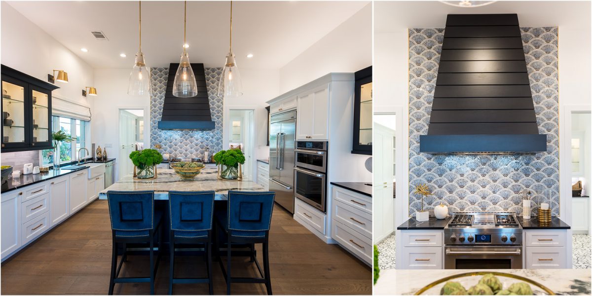 Bright kitchen with a bold patterned backsplash, large black range hood, marble island, and modern pendant lighting.