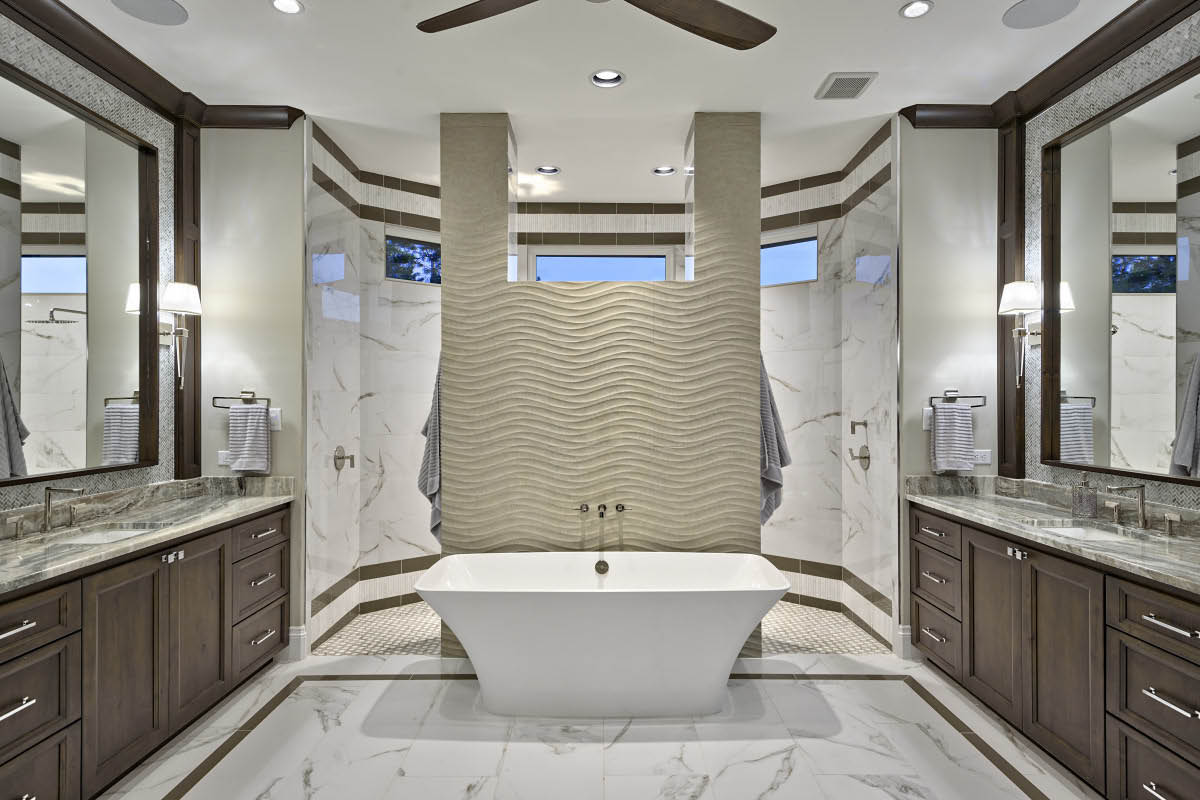 4690-7 Modern Hill Country bathroom design with freestanding tub, textured tile wall, and symmetrical double vanities