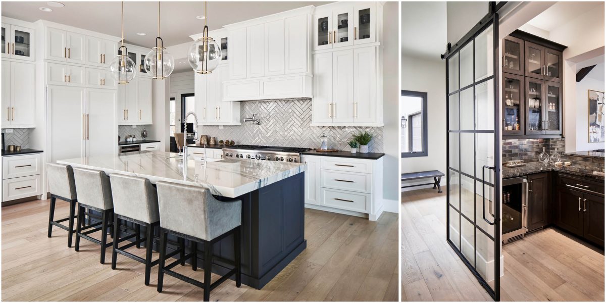Bright open kitchen with polished marble island and designer finishes, flowing into a chic glass-partitioned bar space